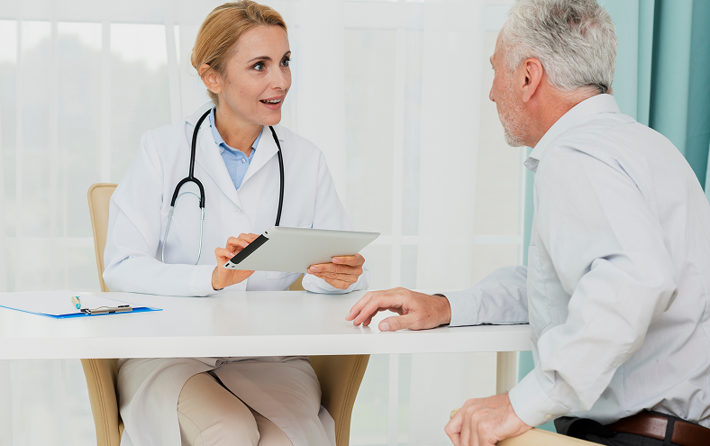 doctor talking to patient